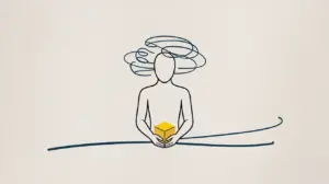 Minimalist drawing of a faceless person with swirling lines above their head, symbolizing thought, holding a small yellow cube in their hands, with a simple curved line beneath them. STG-Health